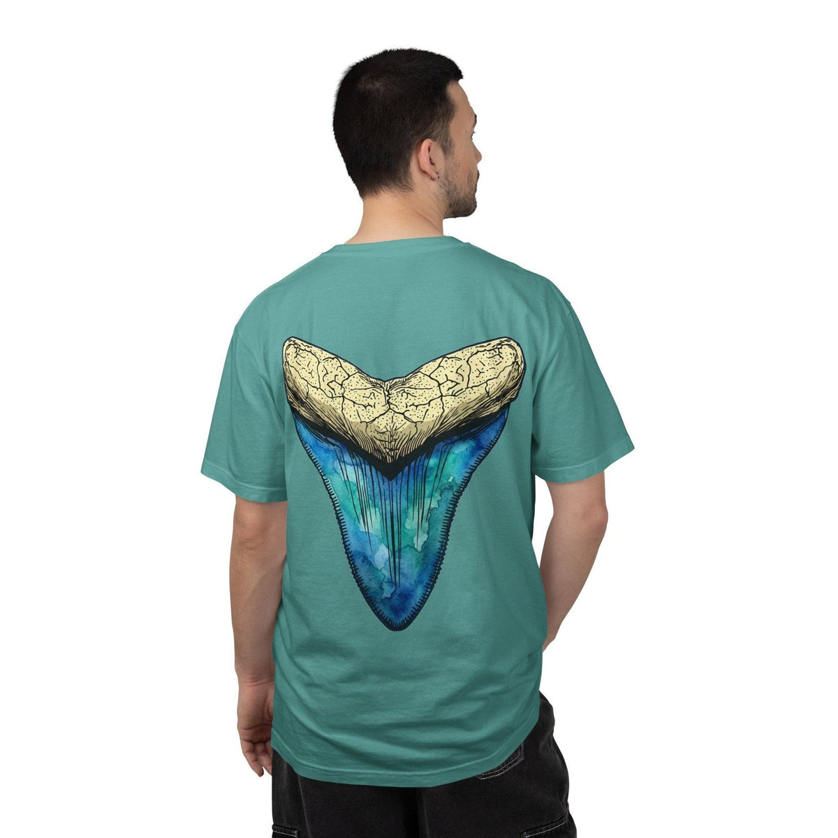 Man wearing a Relic Reef megalodon shark tooth t-shirt